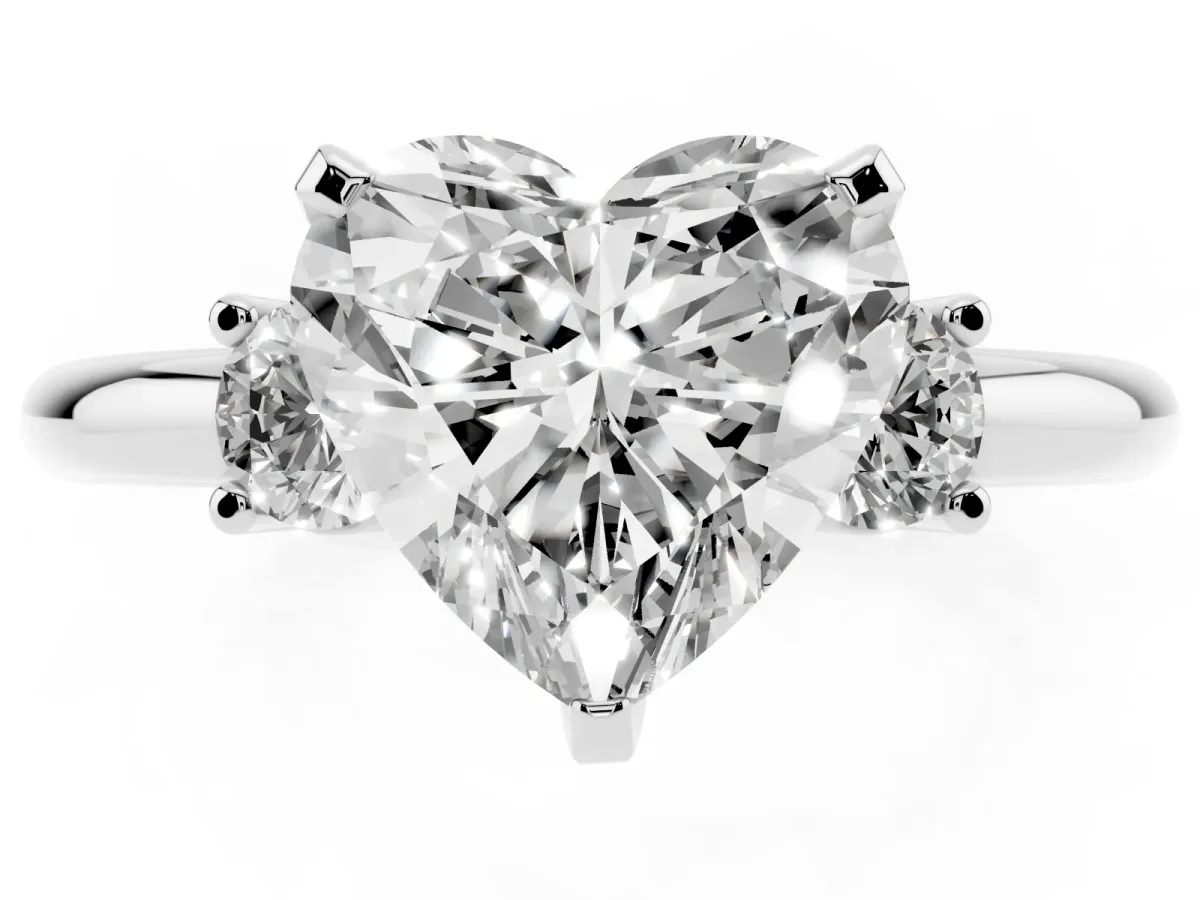 Three-Stone Heart Cut Cut Diamond Solitaire with Prong Setting and Classic Band Silver