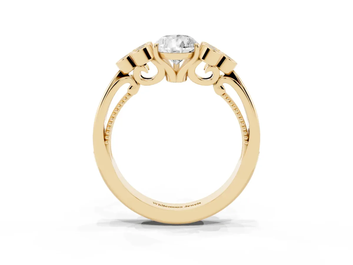 Pear Cut Cut Diamond Engagement Ring with Bezel Set Round Side Stones and Prong Setting Yellow gold