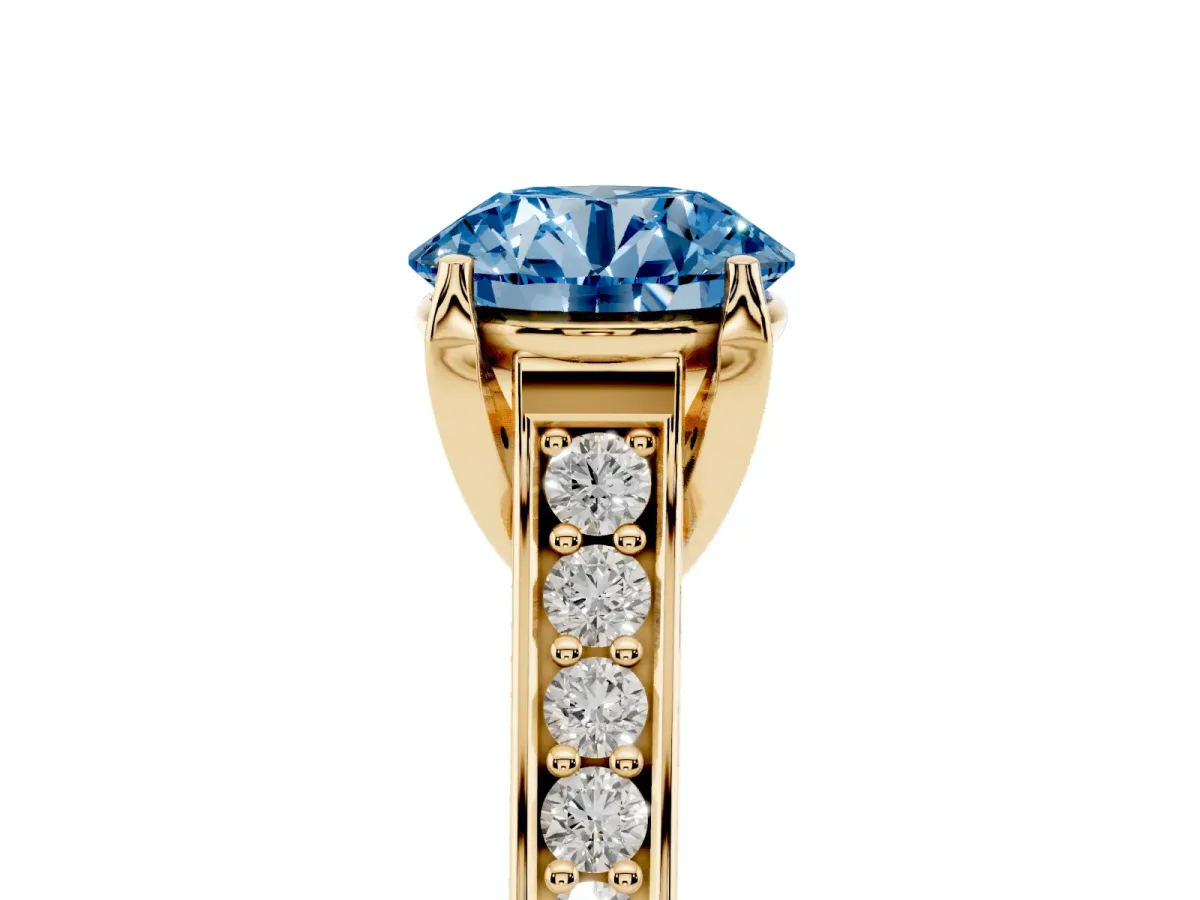 Fancy Blue Round Cut Brilliant Cut Diamond Engagement Ring with Pavé Band and Four-Prong Setting Yellow gold