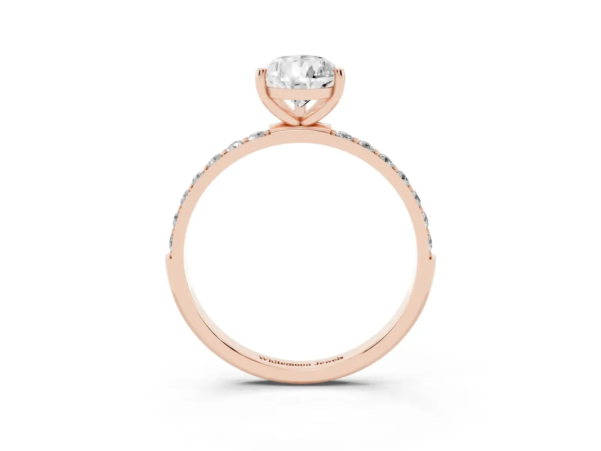Pear Cut Diamond Solitaire Ring with Round Pavé Shoulders and Prong Setting Rose gold