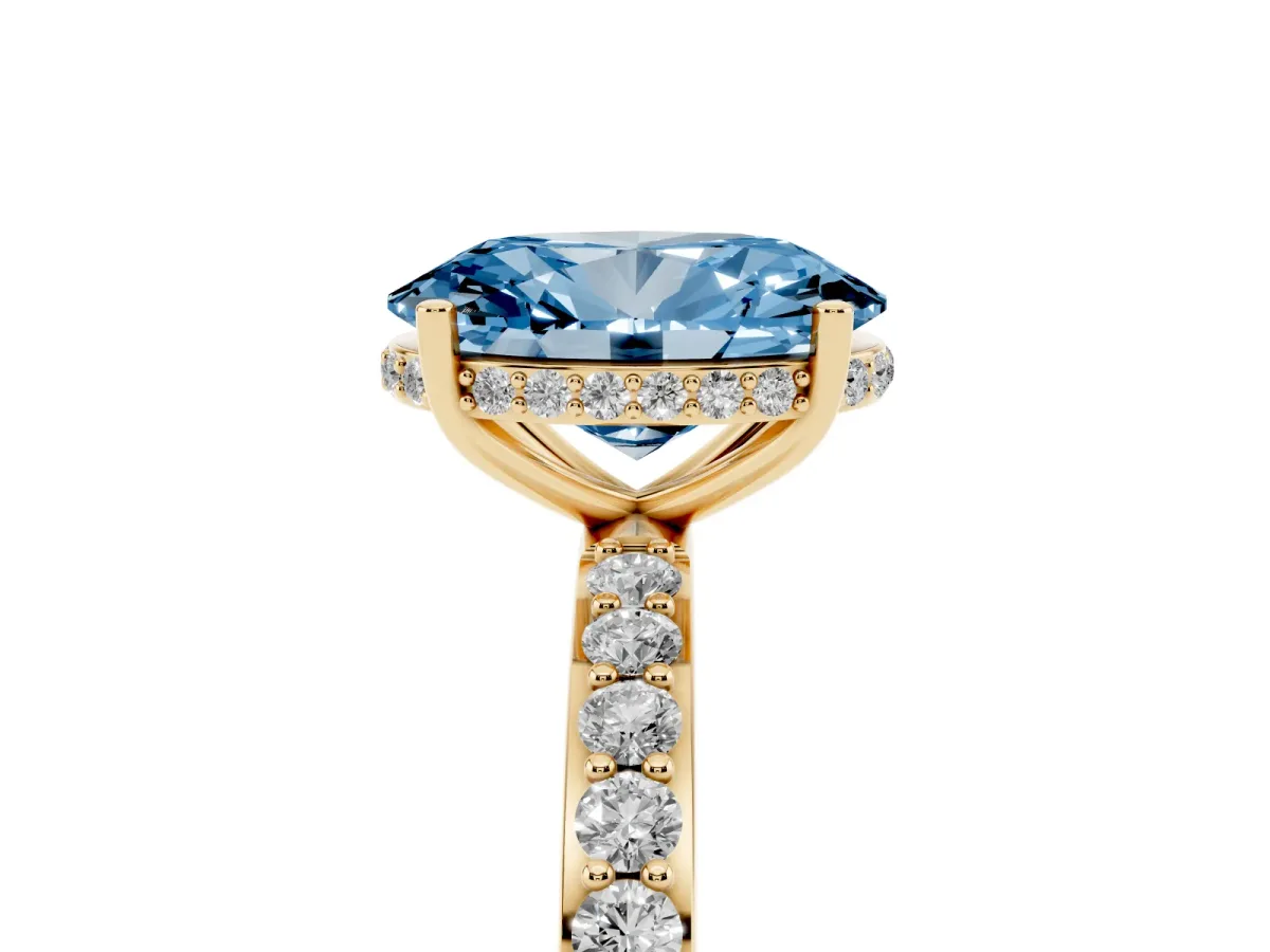 Fancy Blue Oval Cut Diamond Solitaire Ring with Pavé Band and Hidden Halo Yellow gold