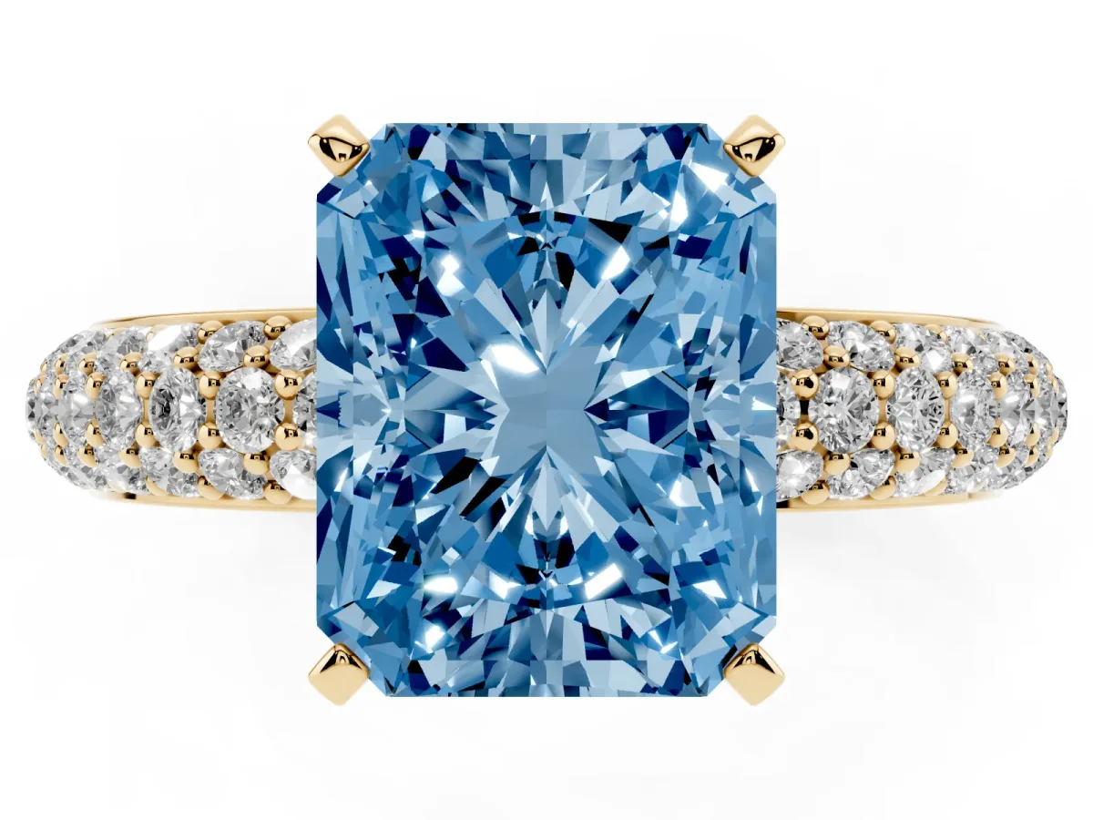 Fancy Blue Radiant Cut Diamond Solitaire Ring with Prong Setting and Pavé Band Yellow gold