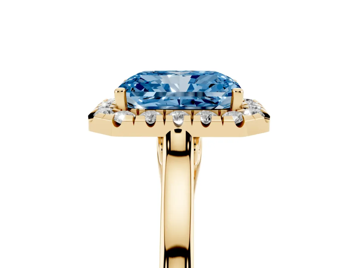 Fancy Blue Radiant Cut Halo Round Diamond Solitaire Ring with Pavé Band and Four-Prong Setting Yellow gold