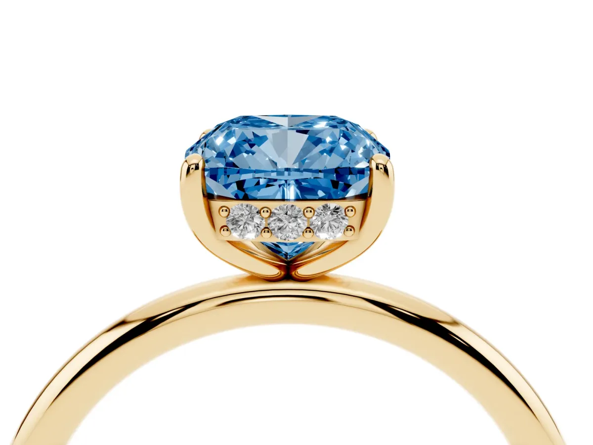 Fancy Blue Cushion Cut Solitaire Diamond Ring with a Classic Band and Four-Prong Setting Yellow gold