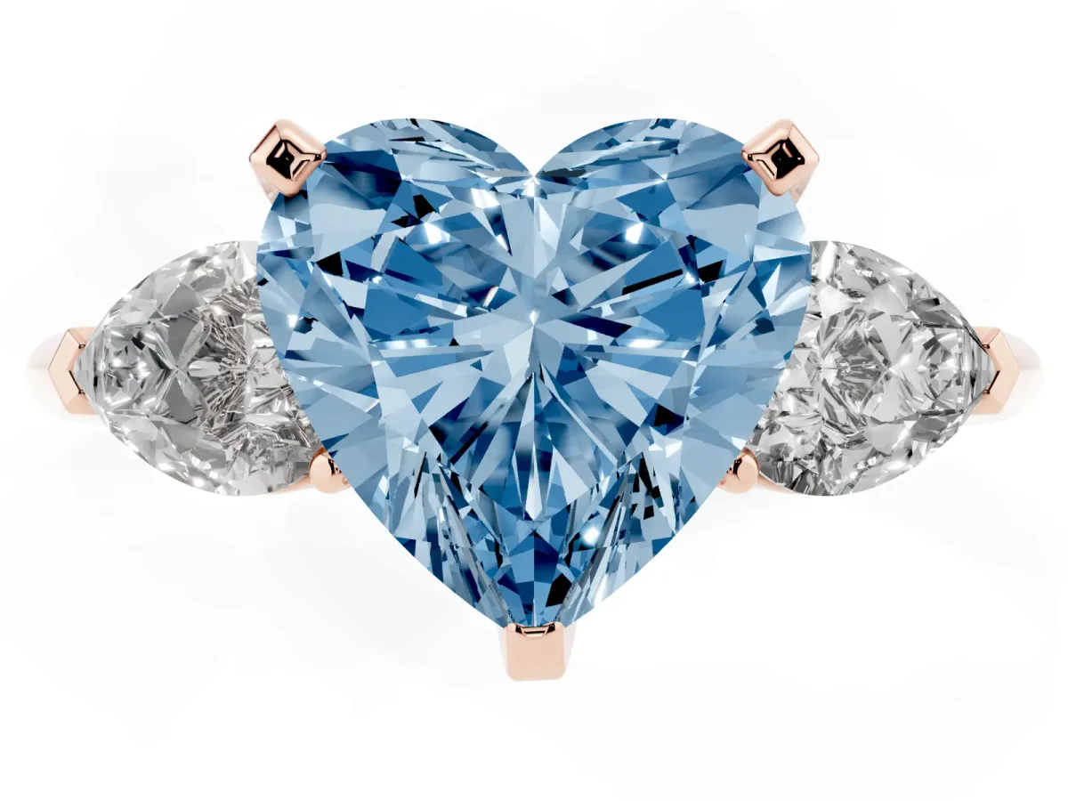 Fancy Blue Three-Stone Heart Cut Diamond Ring with Pear Side Stones and Four-Prong Setting Rose gold