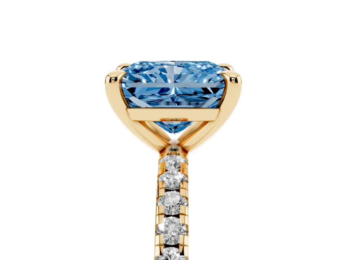 Fancy Blue Radiant Cut Diamond Brilliant Solitaire Ring with Pavé Band and Four-Prong Setting Yellow gold