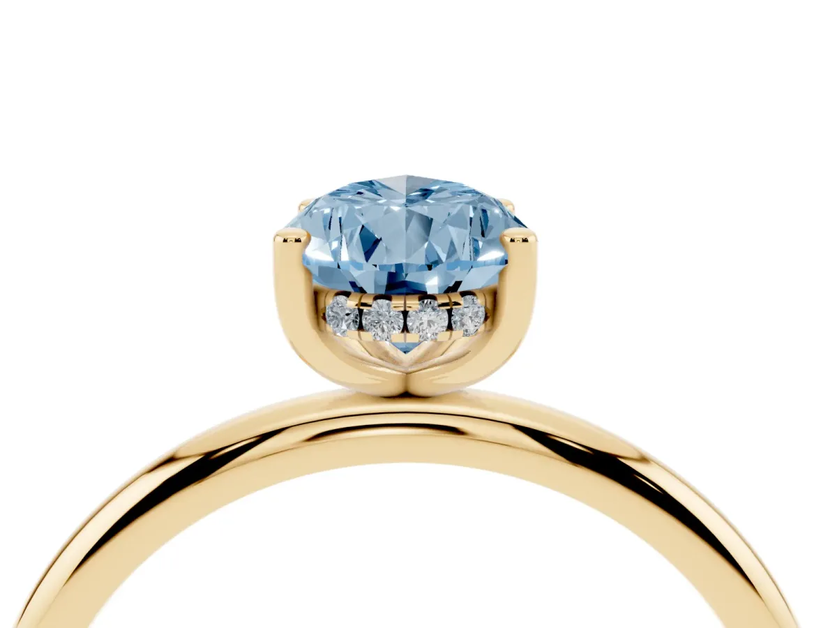 Fancy Blue Pear Cut Cut Solitaire Engagement Ring with Four-Prong Setting and Classic Band Yellow gold