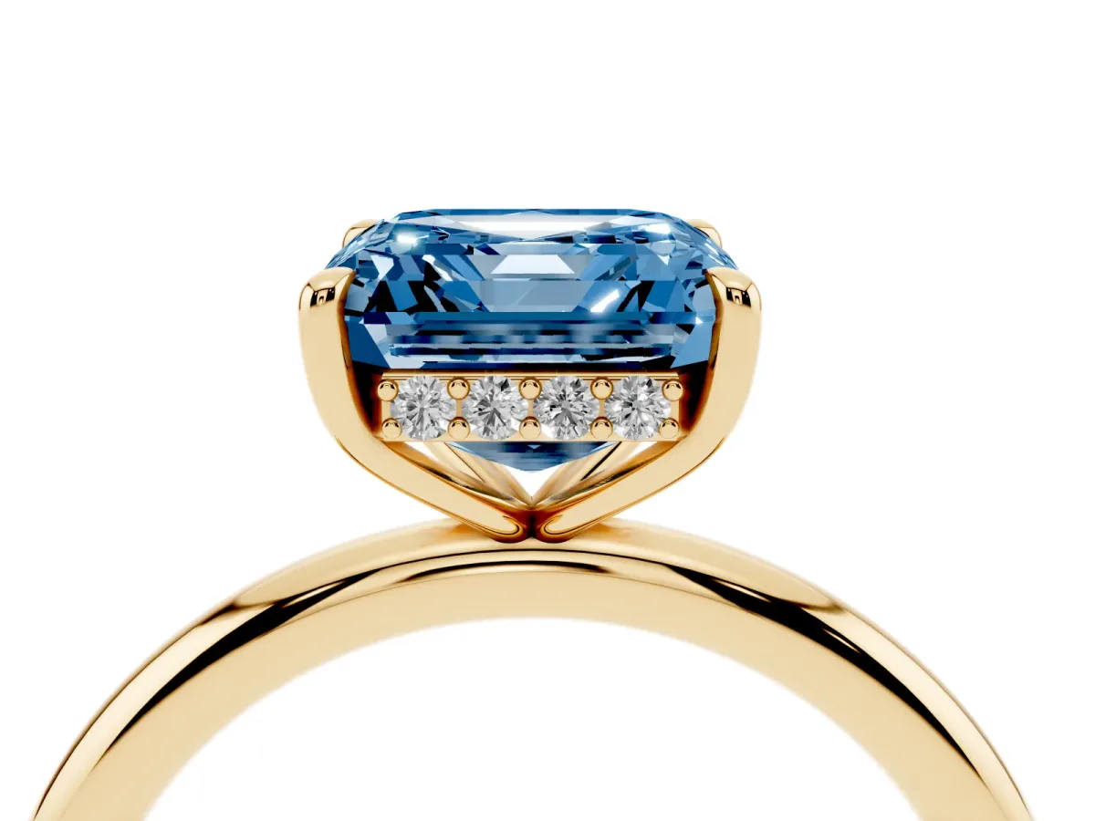 Fancy Blue Asscher Cut Diamond Solitaire Ring with Thin Band and Four-Prong Setting Yellow gold
