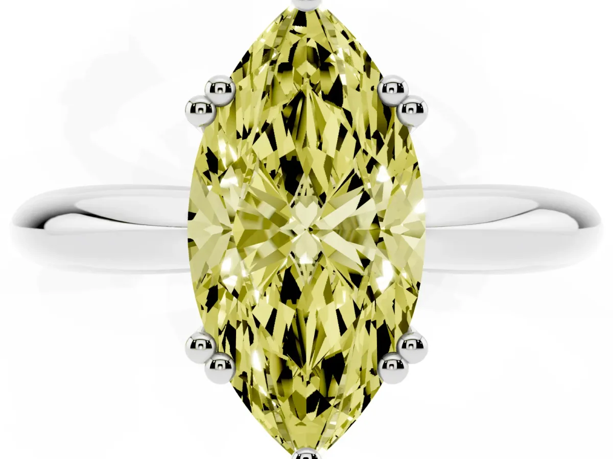 Fancy Yellow Marquise Cut Cut Solitaire Engagement Ring with Tapered Band and Four-Prong Setting White gold