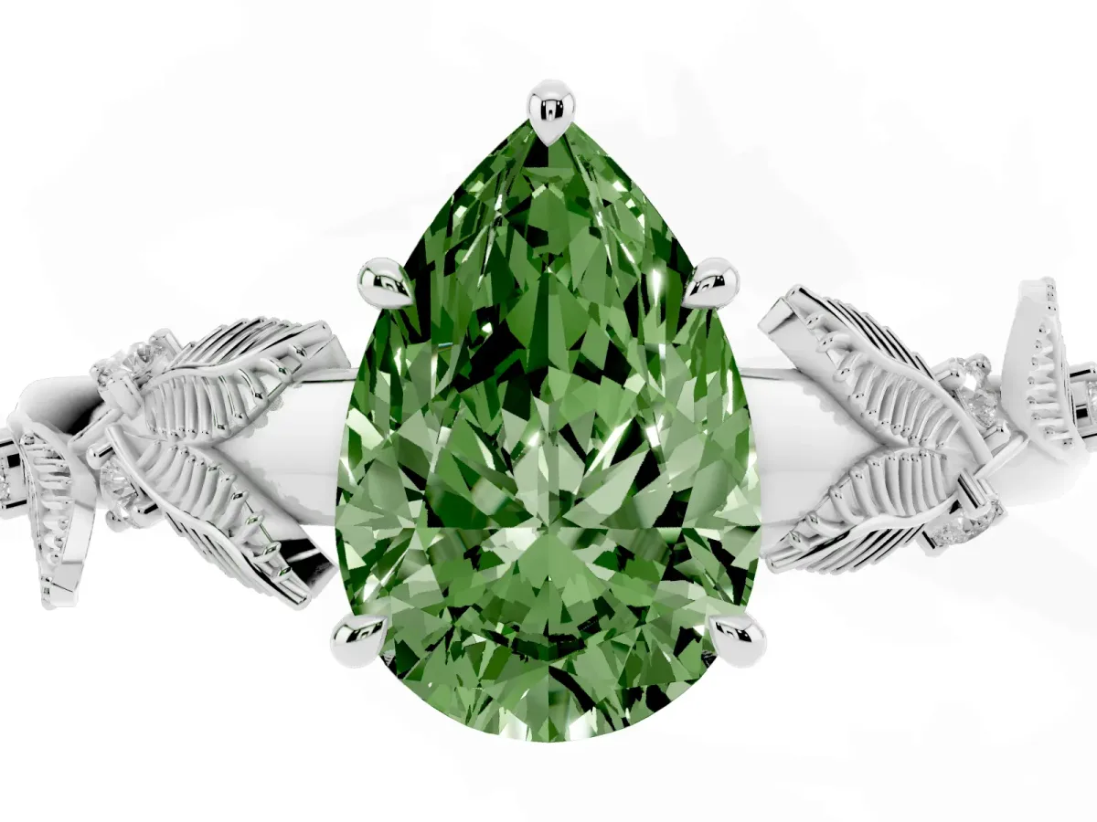 Fancy Green Pear Cut Diamond Solitaire Ring with Leaf Motif Band and Four-Prong Setting Silver