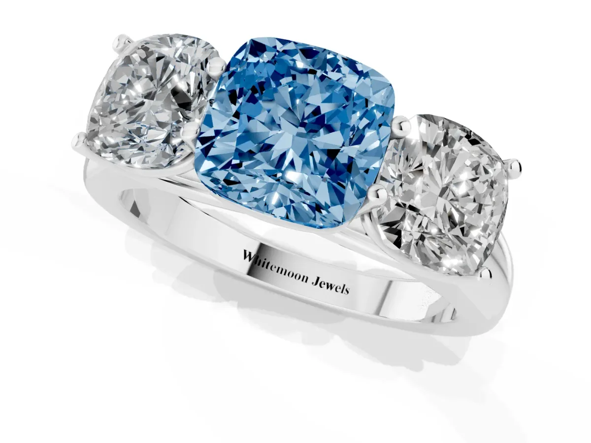 Fancy Blue Cushion Cut Three-Stone Diamond Ring with Prong Setting on a Classic Band Silver