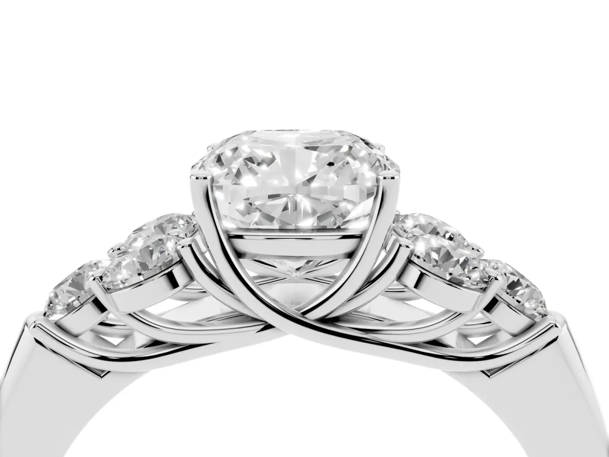 Cushion Cut Cut Diamond Cluster Ring with Round Accent Stones and Prong Setting on a Classic Band Silver