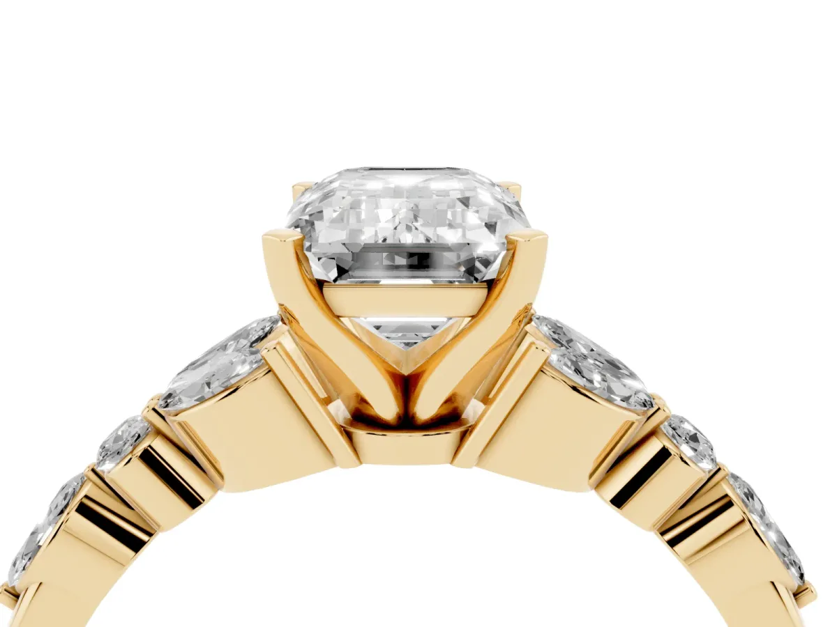 Emerald Cut Diamond Solitaire Ring with Side Stones and Four-Prong Setting Yellow gold