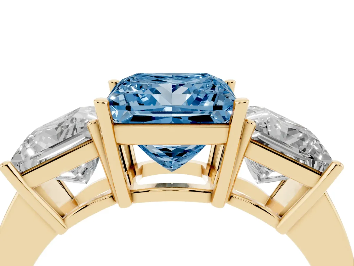 Fancy Blue Three-Stone Princess Cut Cut Diamond Engagement Ring with Flat Band and Four-Prong Setting Yellow gold