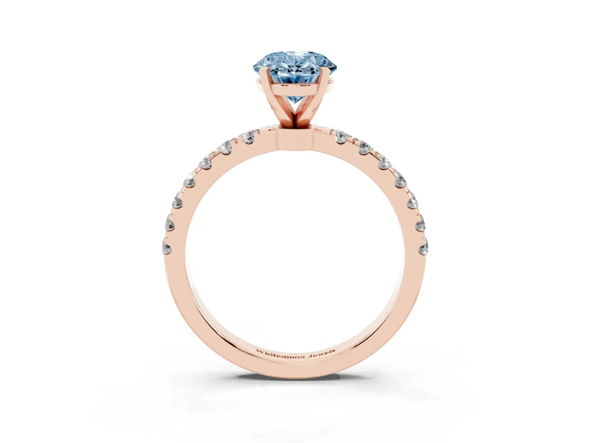 Fancy Blue Oval Cut Diamond Solitaire Ring with Pavé Accents and Four-Prong Setting Rose gold
