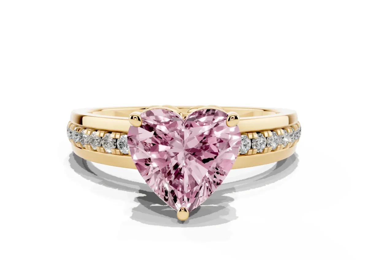 Fancy Pink Heart Cut Solitaire Diamond Ring with Channel Set Band and Six-Prong Setting Yellow gold