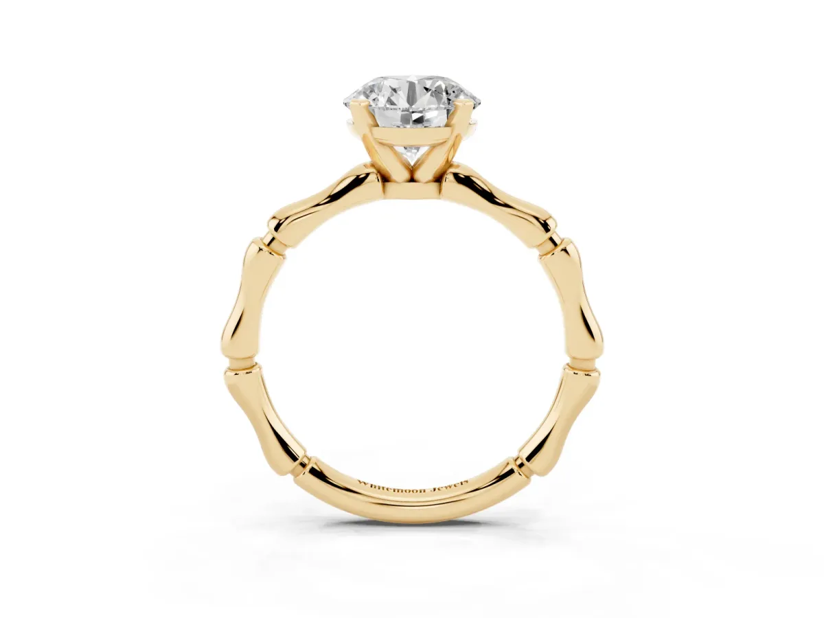 Round Cut Solitaire Diamond Ring with Bamboo Band and Four-Prong Setting Yellow gold