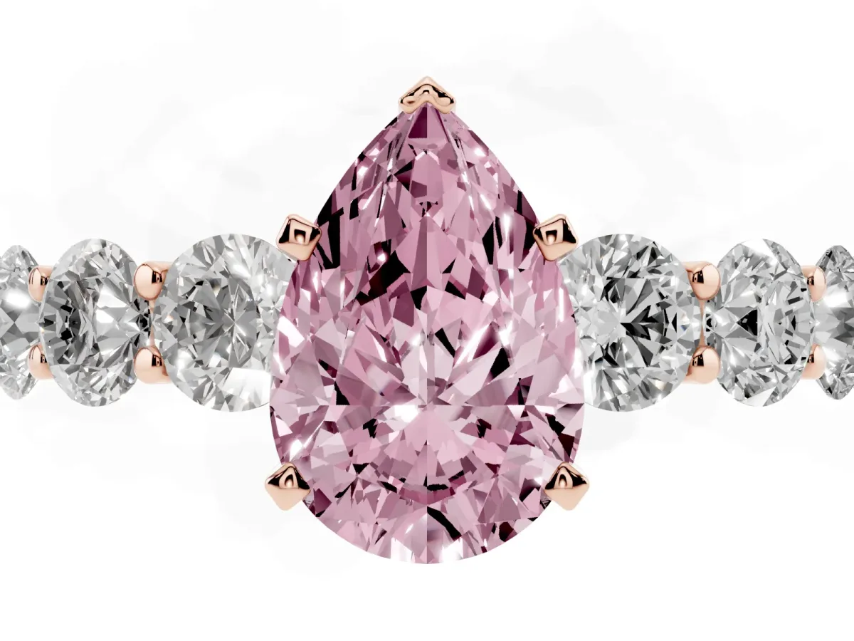 Fancy Pink Pear Cut Diamond Prong Setting with Side Stones on a Pave Band Rose gold