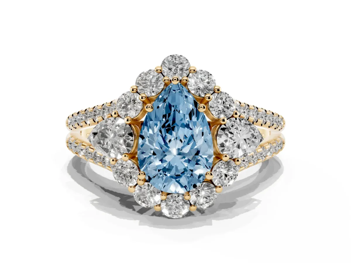 Fancy Blue Pear Cut Halo Split Shank Diamond Engagement Ring with Prong Setting Yellow gold