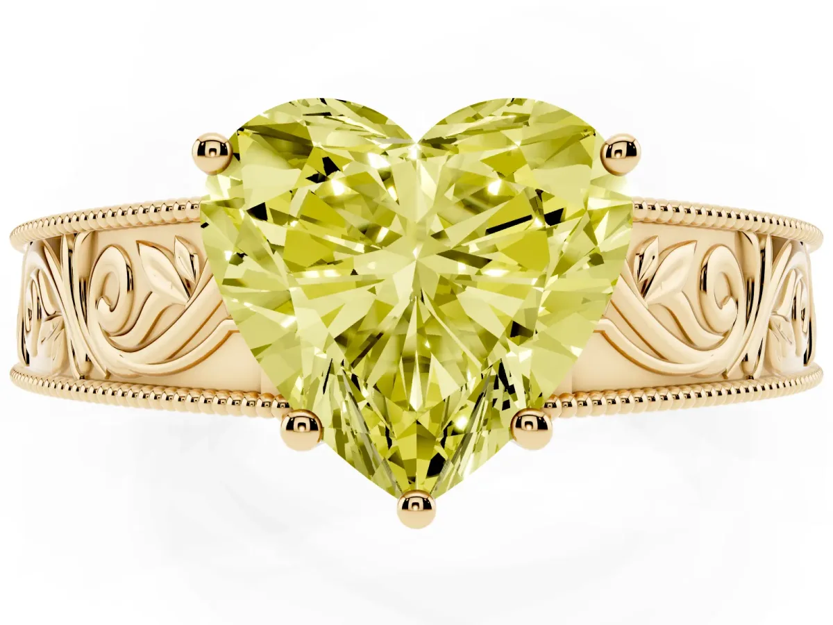 Fancy Yellow Heart Cut Diamond Solitaire Ring with Engraved Band and Four-Prong Setting Yellow gold