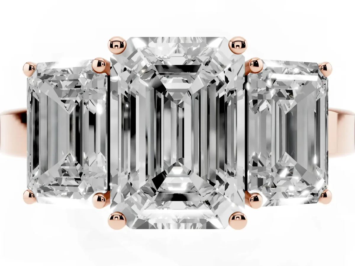 Three-Stone Emerald Cut Cut Diamond Engagement Ring with Flat Band and Four-Prong Setting Rose gold