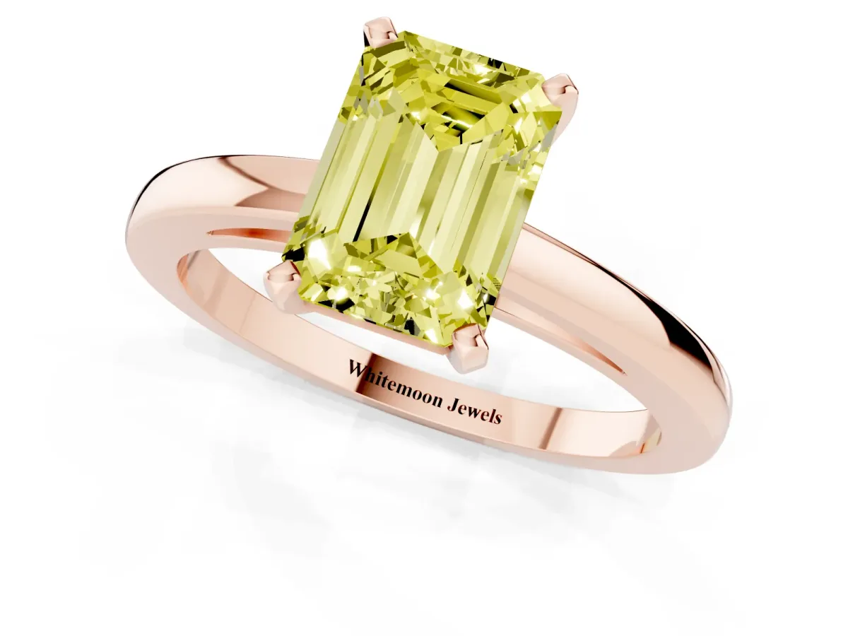 Fancy Yellow Emerald Cut Solitaire Diamond Engagement Ring with Four-Prong Setting on a Classic Band Rose gold