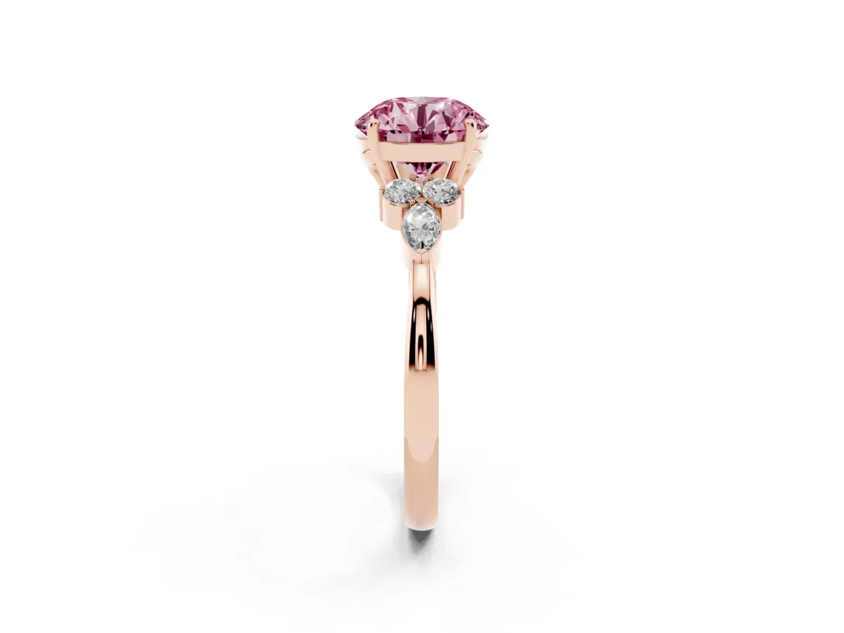 Fancy Pink Round Cut Brilliant Diamond Solitaire Ring with Pear Side Stones and Four-Prong Setting Rose gold