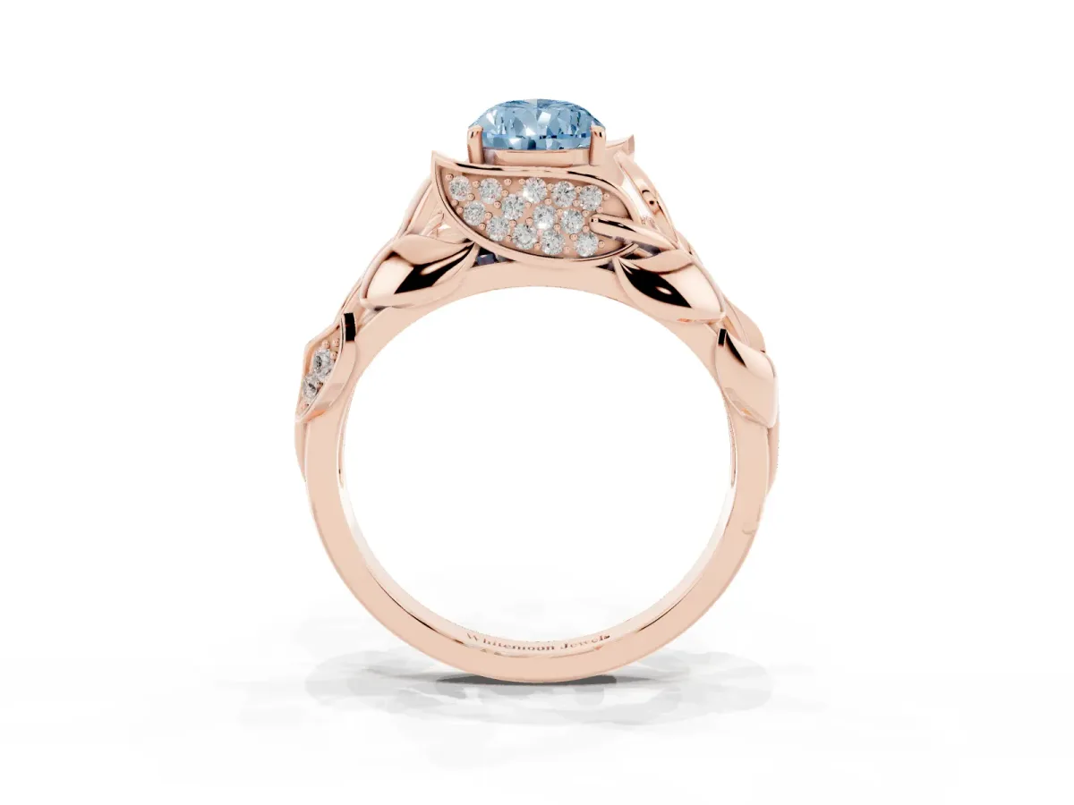 Fancy Blue Pear Cut Diamond Leaf-Inspired Engagement Ring with Round Accents and Prong Setting Rose gold