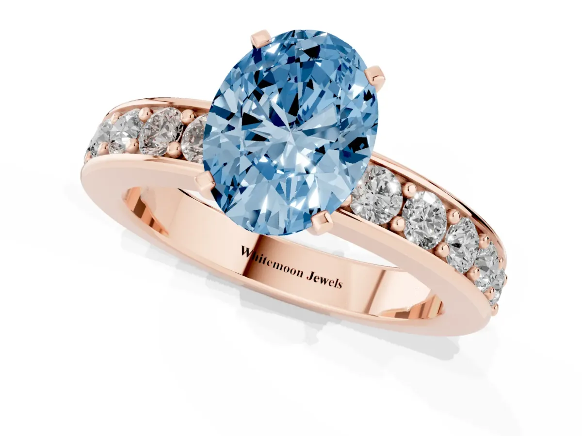 Fancy Blue Oval Cut Diamond Engagement Ring with Channel Set Round Band and Prong Setting Rose gold