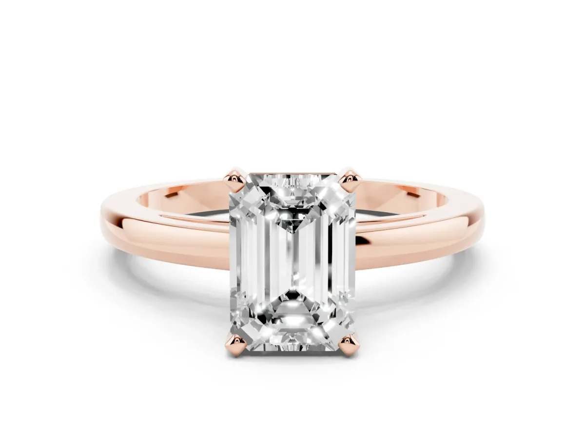 Emerald Cut Solitaire Diamond Engagement Ring with Four-Prong Setting on a Classic Band Rose gold