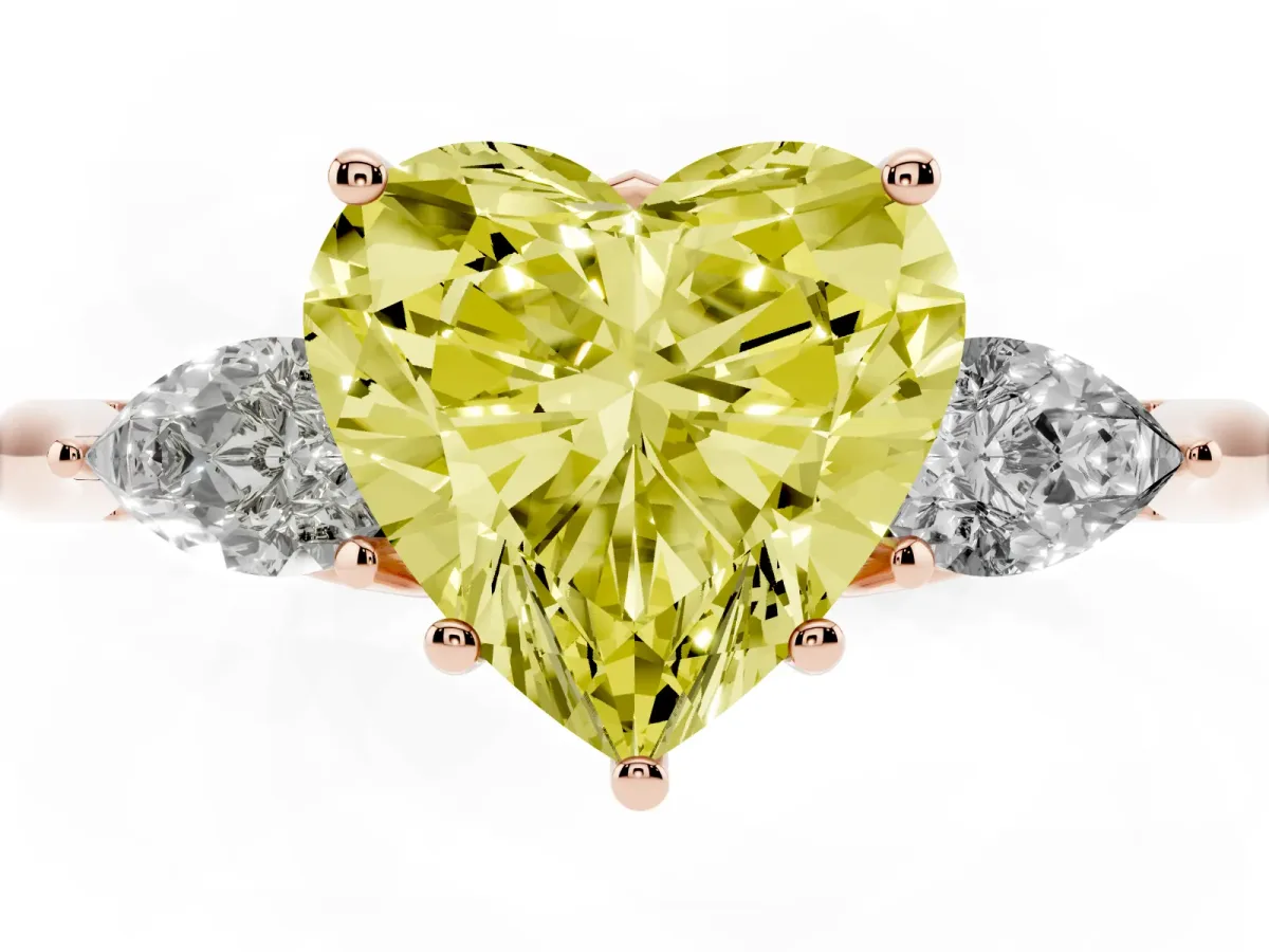 Fancy Yellow Heart Cut Diamond Three-Stone Ring with Pear Side Stones and Prong Setting Rose gold
