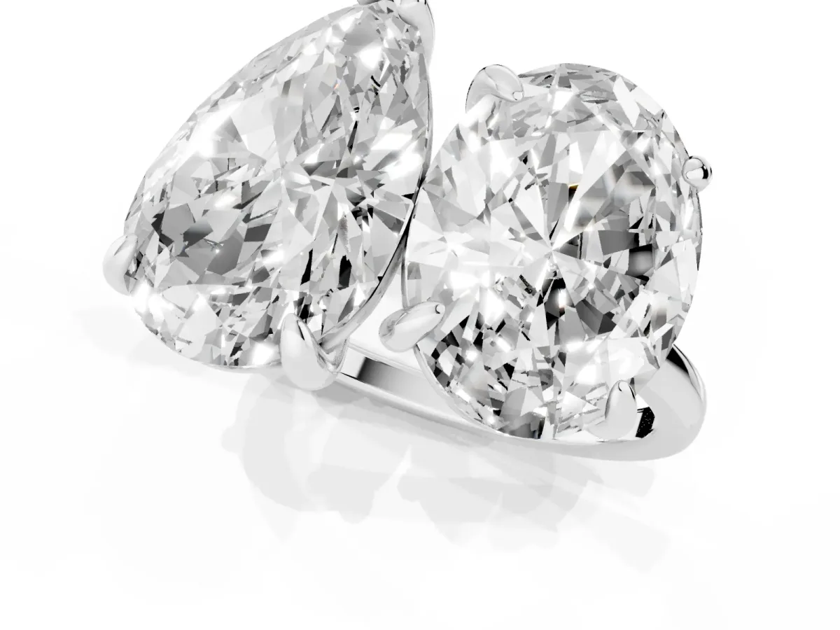 Oval and Pear Toi Moi Ring with Prong Setting and Plain Band White gold