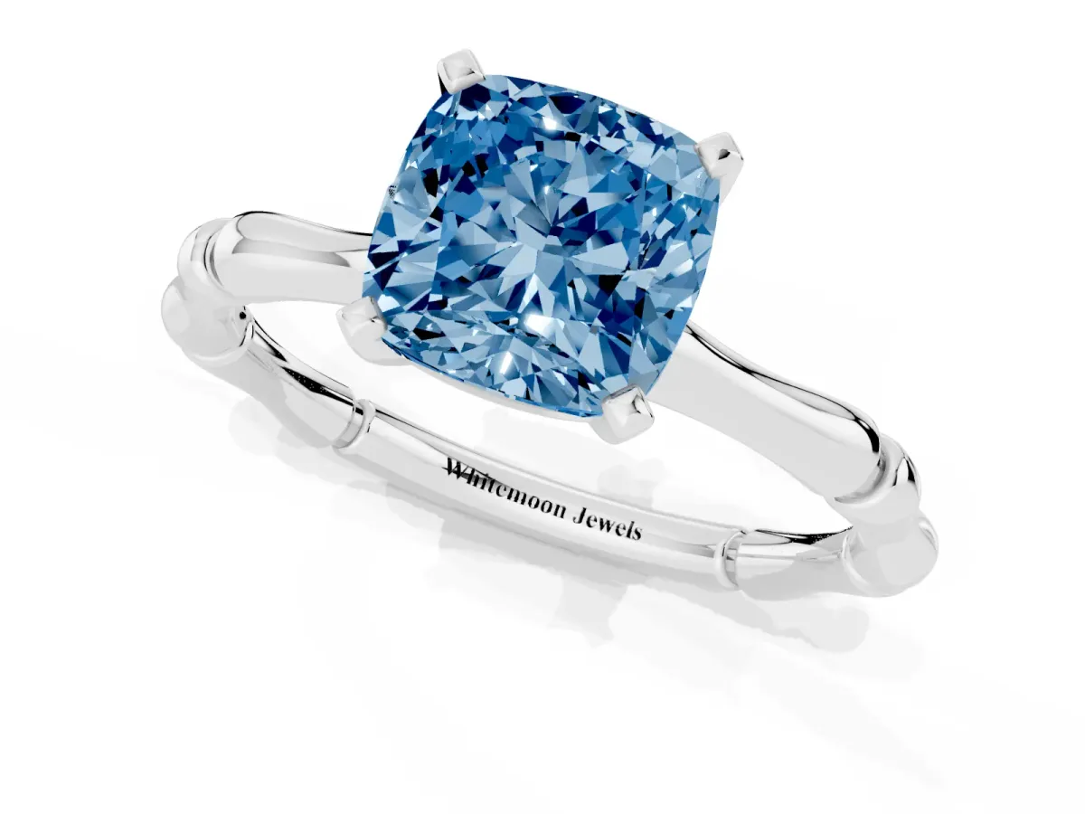 Fancy Blue Cushion Cut Solitaire Diamond Ring with Bamboo Band and Four-Prong Setting Silver