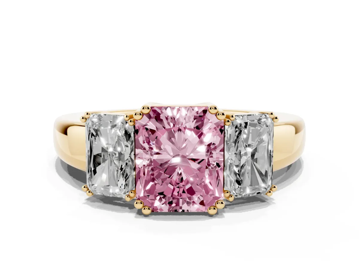 Fancy Pink Three-Stone Radiant Cut Cut Diamond Ring with Channel Set Band and Four-Prong Setting Yellow gold