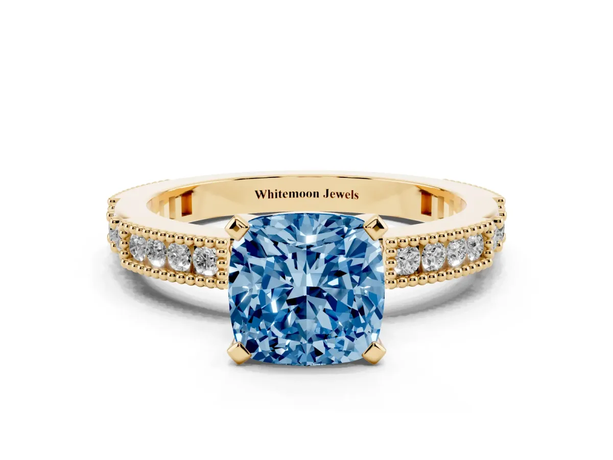 Fancy Blue Cushion Cut Solitaire with Pavé Band and Four-Prong Setting Yellow gold