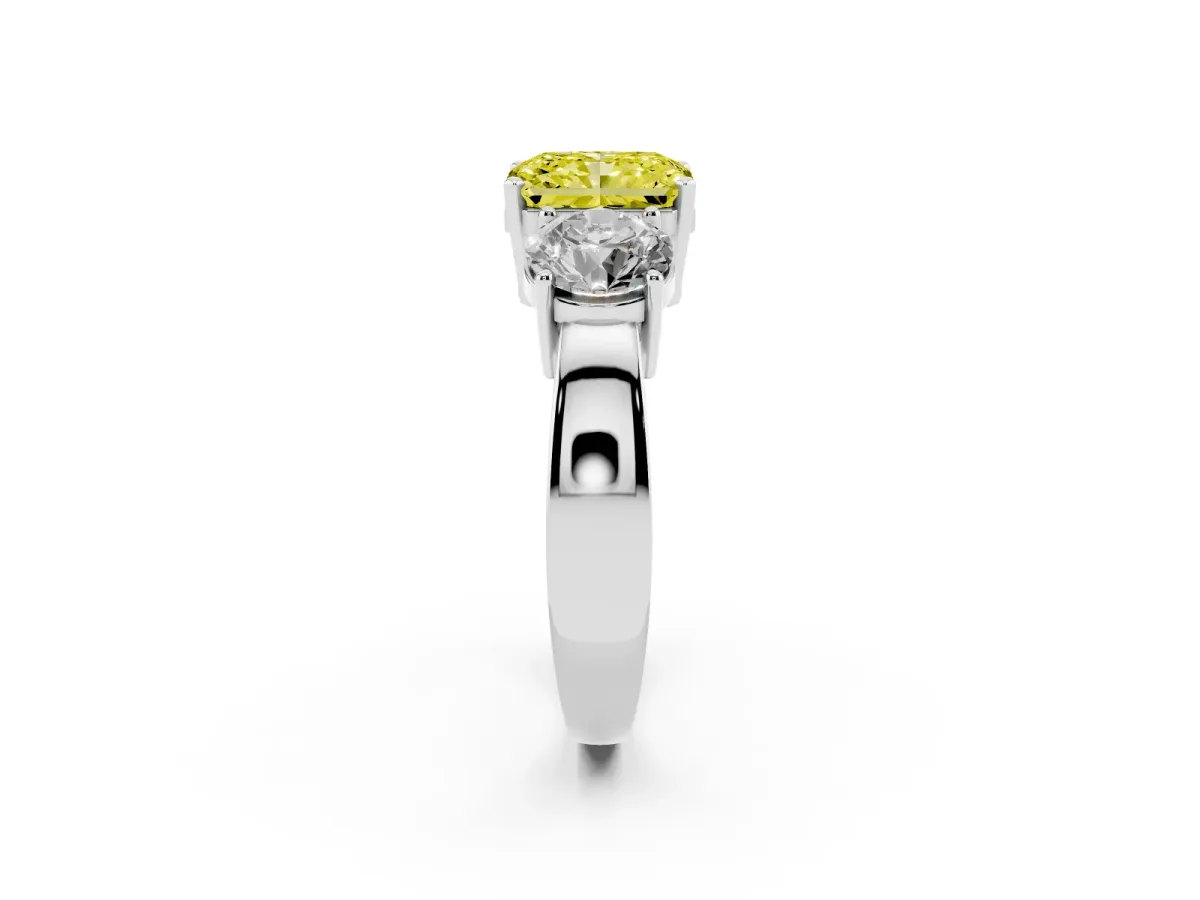 Fancy Yellow Three-Stone Radiant Cut Diamond Ring with Round Side Stones, Classic Band, and Four-Prong Setting Platinum