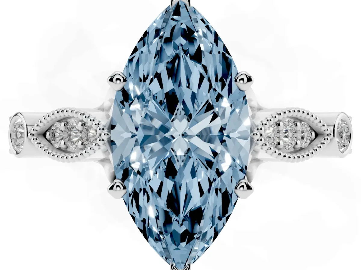Fancy Blue Marquise Cut Cut Diamond with Milgrain Marquise and Bezel Accents on a Solitaire Band with Prong Setting Silver