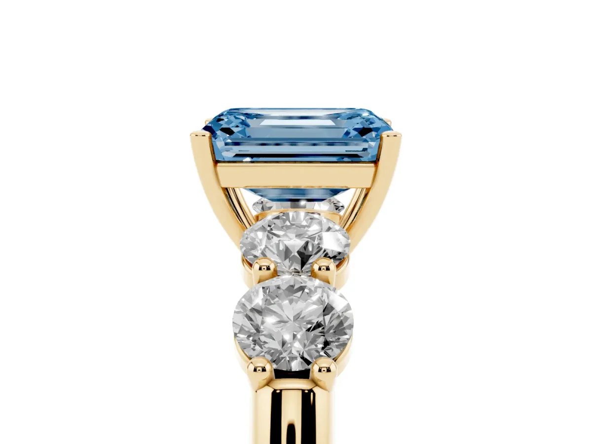 Fancy Blue Emerald Cut Cut Five-Stone Prong Set Diamond Ring with Classic Band Yellow gold