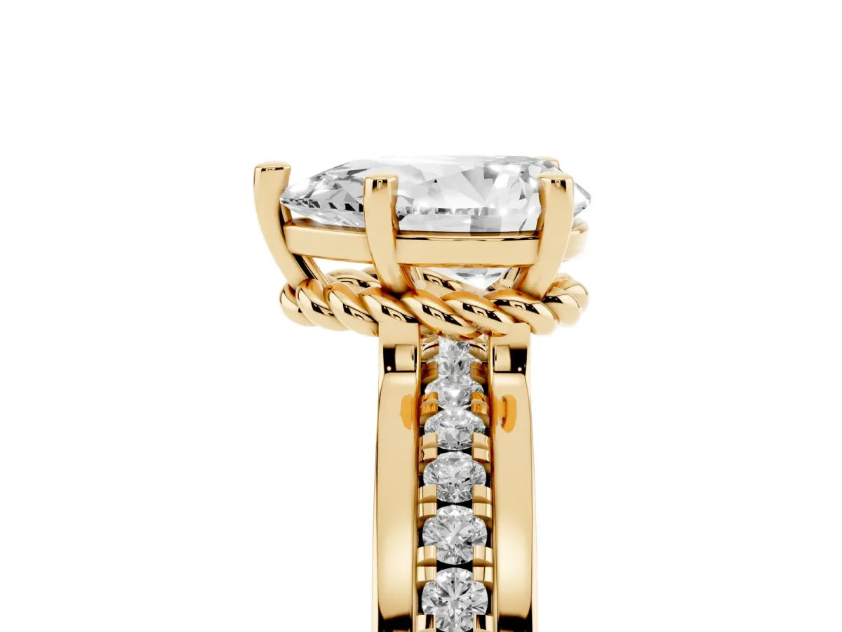 Pear Cut Solitaire Diamond Ring with Channel Set Band and Six-Prong Setting Yellow gold