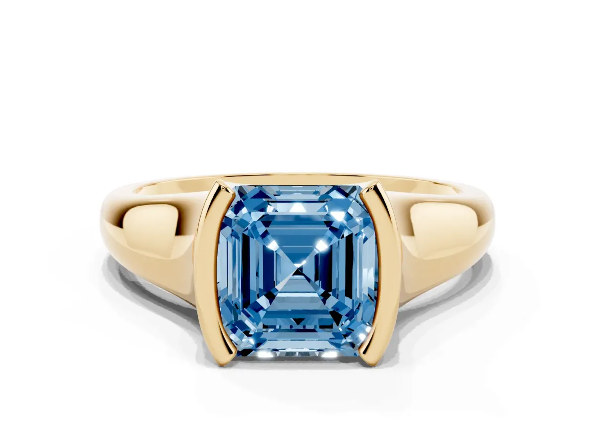 Fancy Blue Asscher Cut Solitaire Tension Set Diamond Ring with Split Shank Band Yellow gold