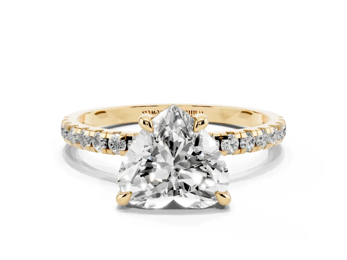 Heart Cut Diamond Brilliant Solitaire Ring with Pavé Band and Four-Prong Setting Yellow gold