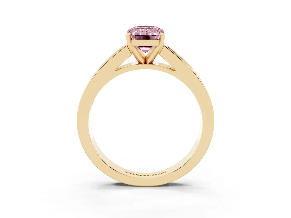Fancy Pink Emerald Cut Solitaire Diamond Ring with Channel-Set Band and Four-Prong Setting Yellow gold
