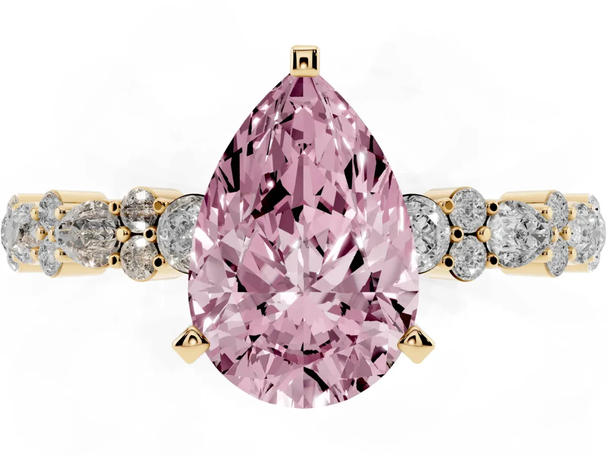 Fancy Pink Pear Cut Diamond Side Stone Solitaire Ring with Round and Four-Prong Setting Yellow gold