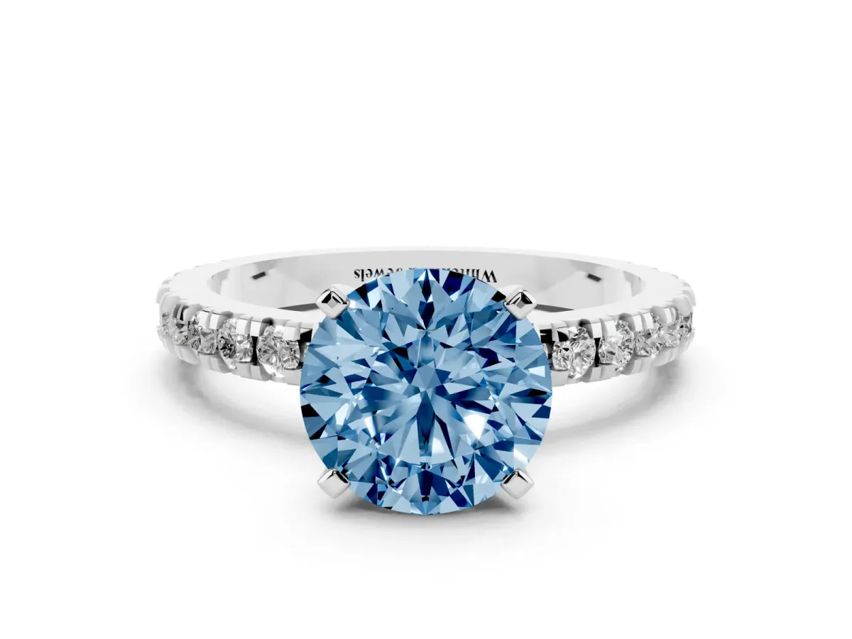 Fancy Blue Round Cut Diamond Pavé Band Solitaire with Four-Prong Setting Platinum