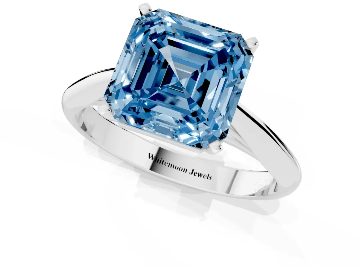 Fancy Blue Asscher Cut Diamond Solitaire Engagement Ring with Cathedral Setting and Four-Prong Mount Silver