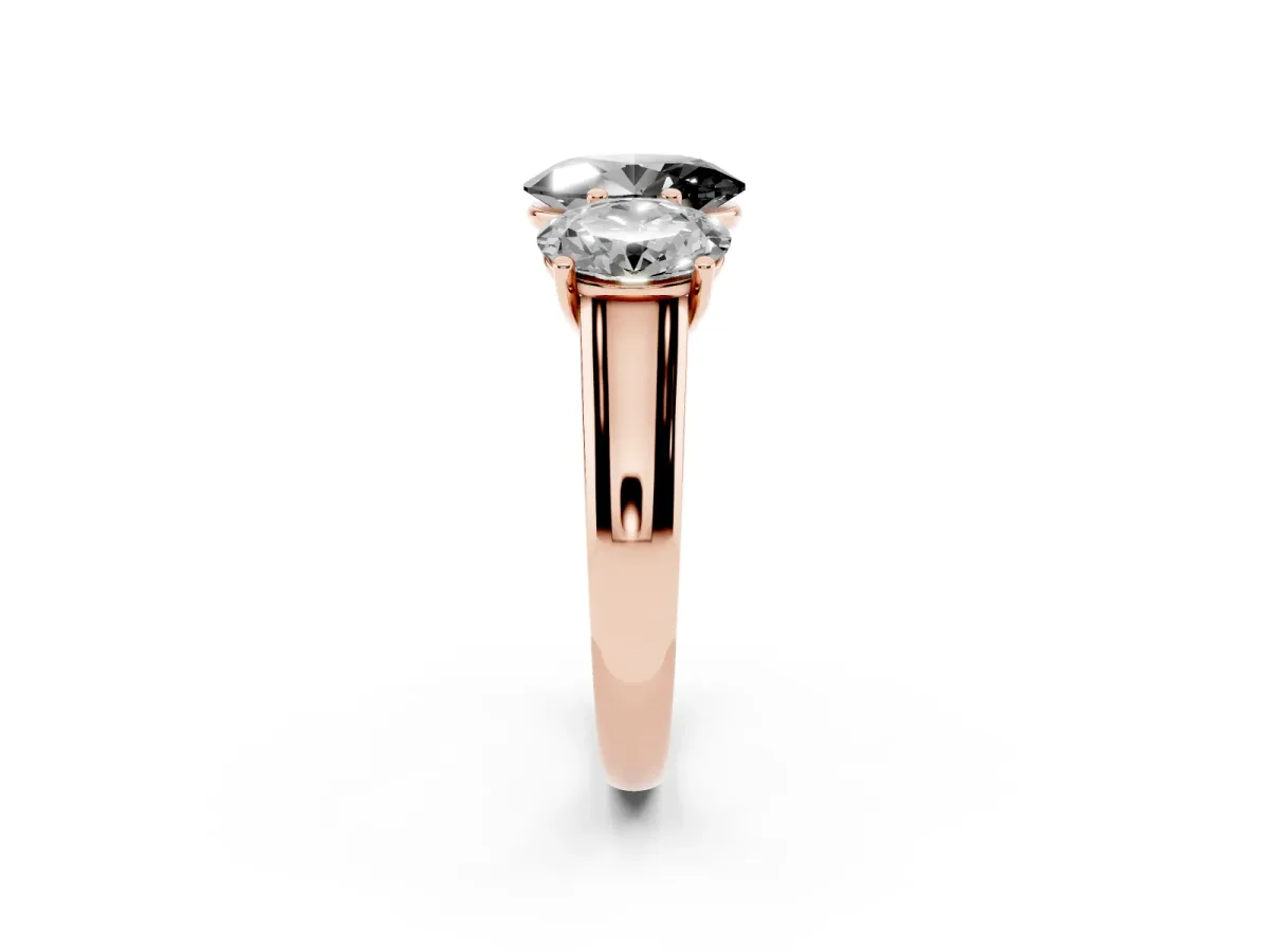 Fancy Black Oval Cut Three-Stone Diamond Ring with Prong Setting on a Classic Band Rose gold