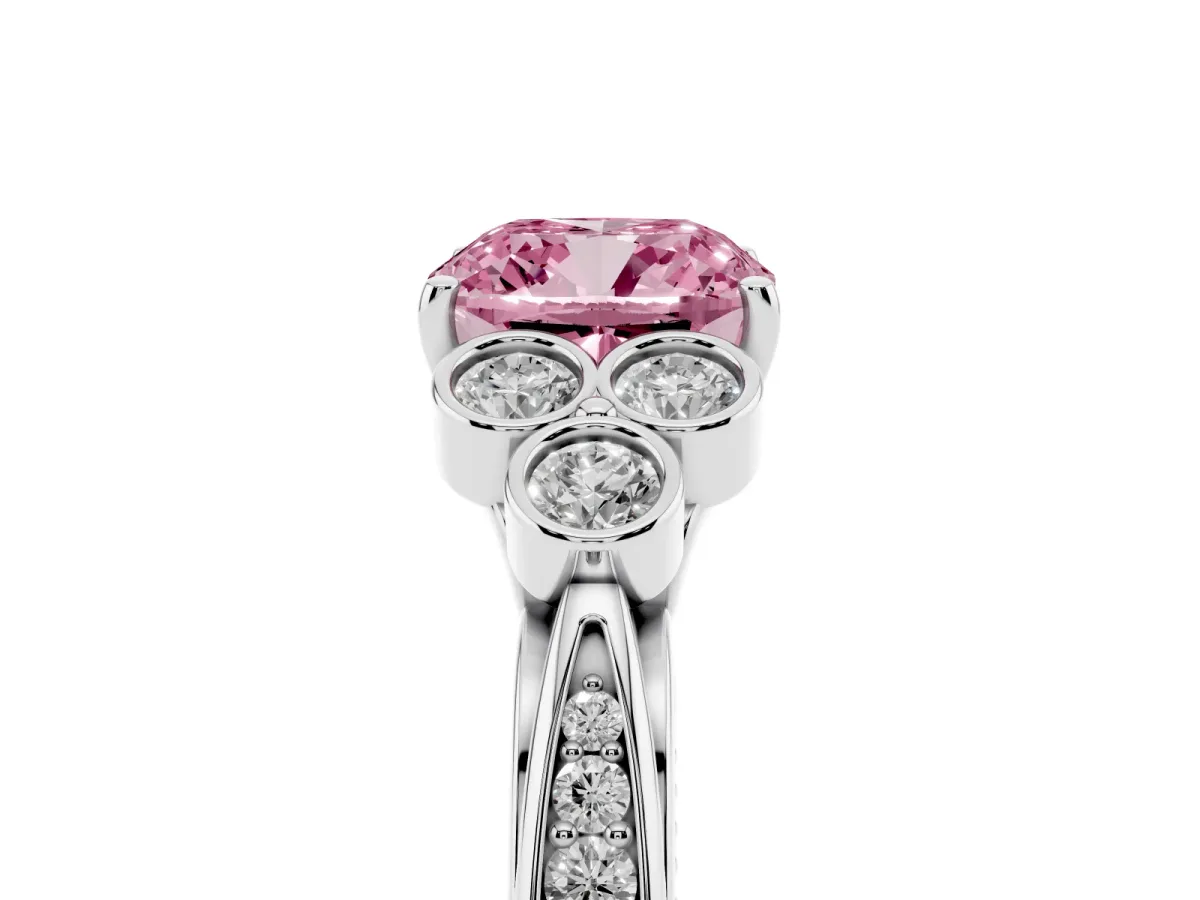 Fancy Pink Cushion Cut Cut Diamond Engagement Ring with Bezel Set Round Side Stones and Prong Setting Platinum