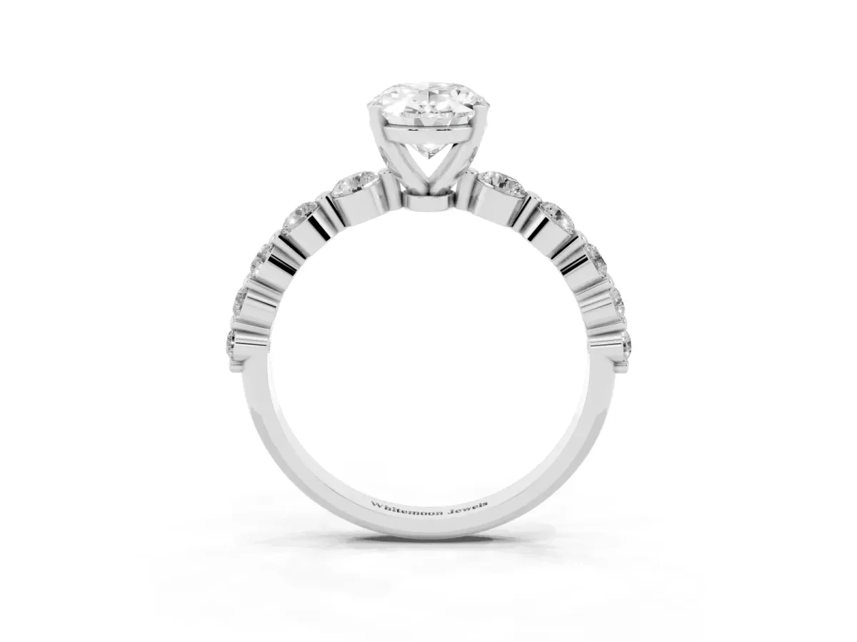 Oval Cut Solitaire Diamond Ring with Pave Band and Four-Prong Setting Silver