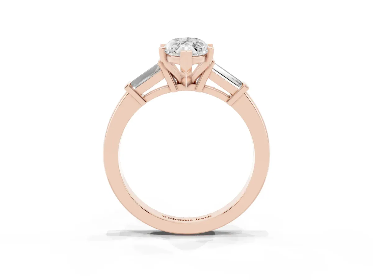 Marquise Cut Cut Diamond Solitaire Ring with Tapered Baguette Accents and Four-Prong Setting Rose gold