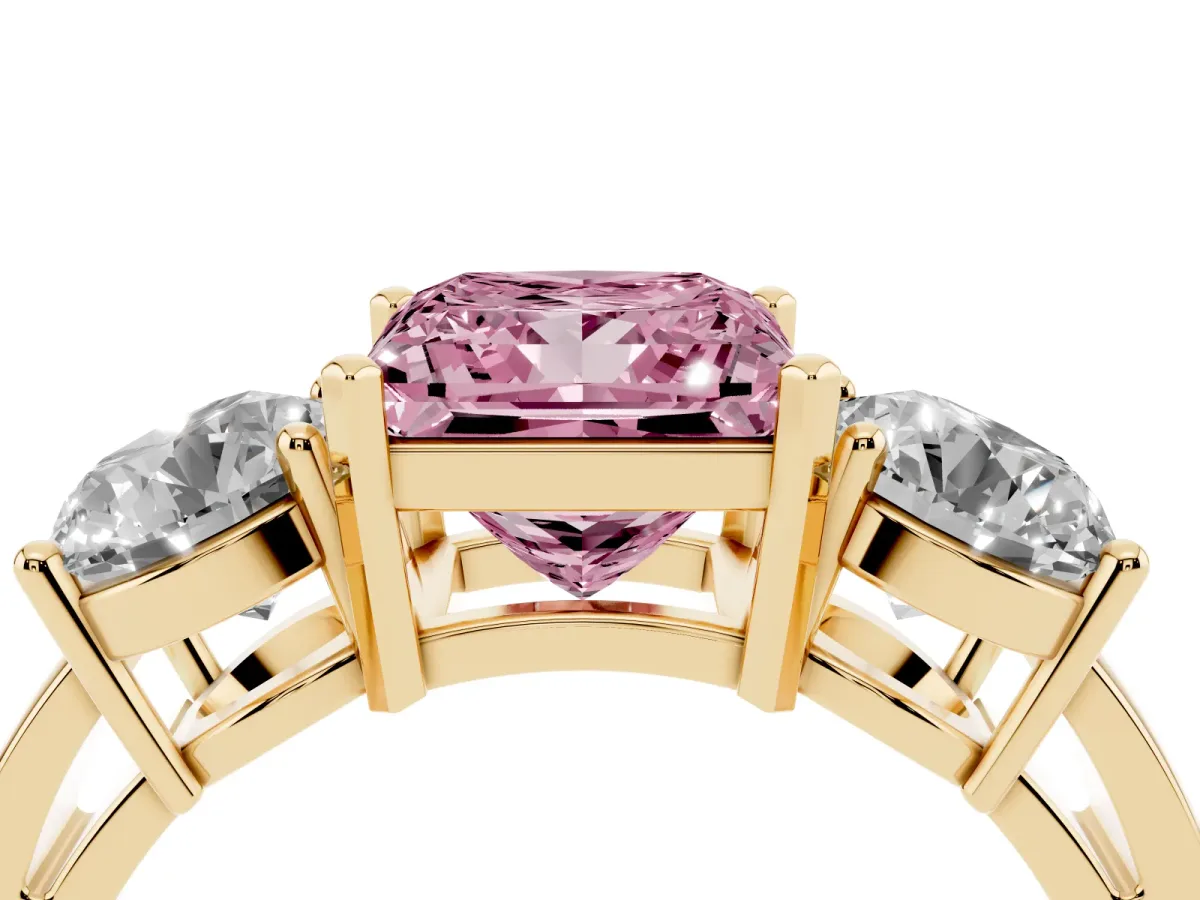 Fancy Pink Three-Stone Princess Cut Diamond Ring with Round Side Stones, Classic Band, and Four-Prong Setting Yellow gold